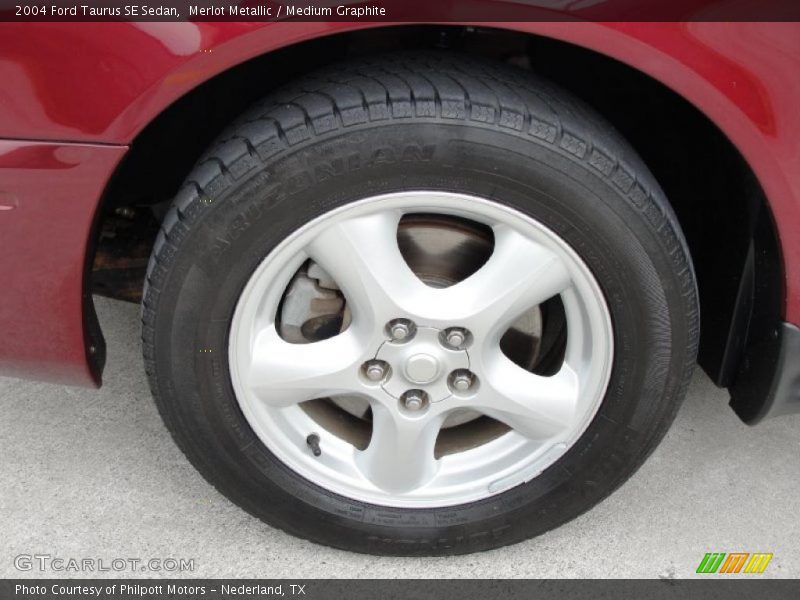 Merlot Metallic / Medium Graphite 2004 Ford Taurus SE Sedan