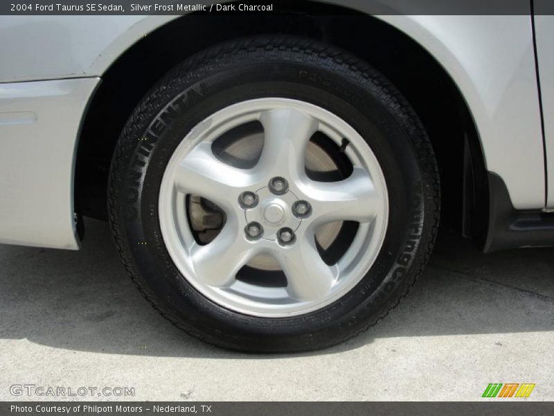 Silver Frost Metallic / Dark Charcoal 2004 Ford Taurus SE Sedan