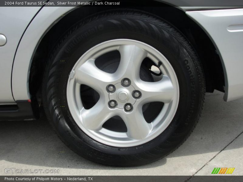 Silver Frost Metallic / Dark Charcoal 2004 Ford Taurus SE Sedan