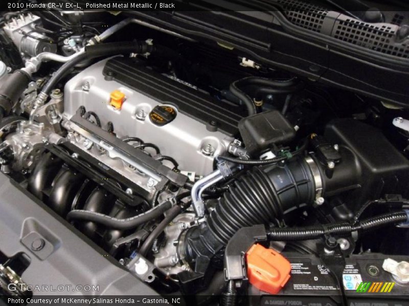 Polished Metal Metallic / Black 2010 Honda CR-V EX-L