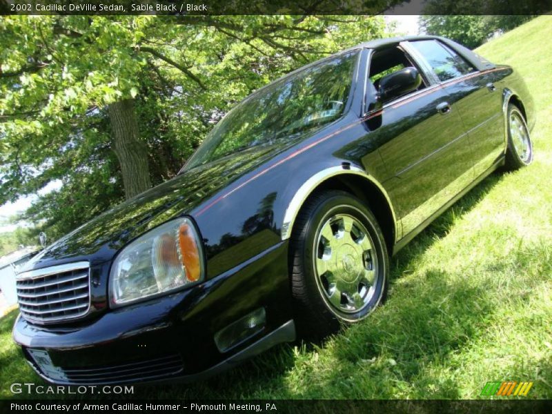 Sable Black / Black 2002 Cadillac DeVille Sedan