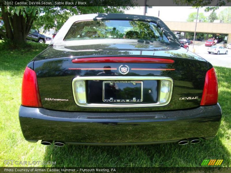 Sable Black / Black 2002 Cadillac DeVille Sedan