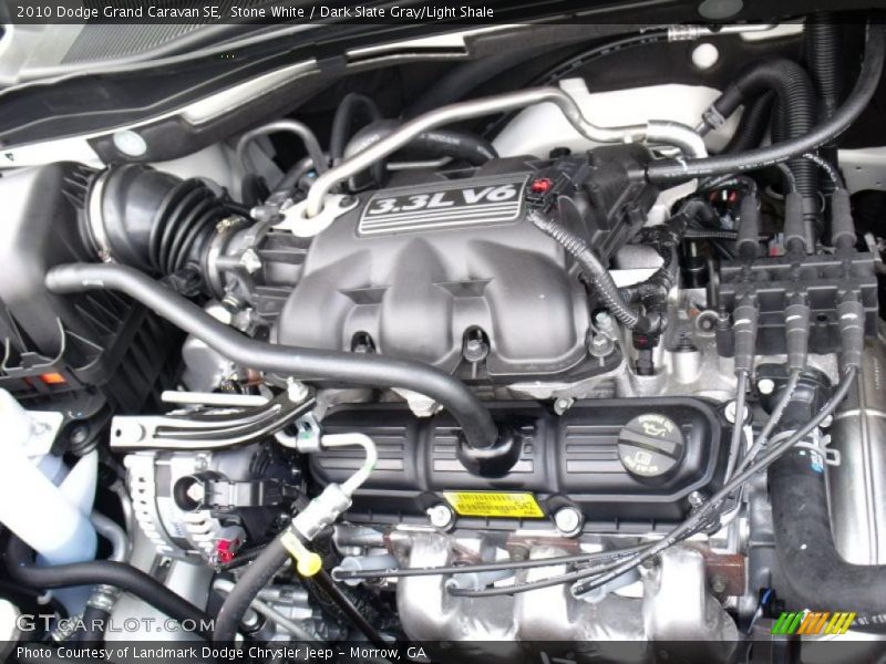 Stone White / Dark Slate Gray/Light Shale 2010 Dodge Grand Caravan SE