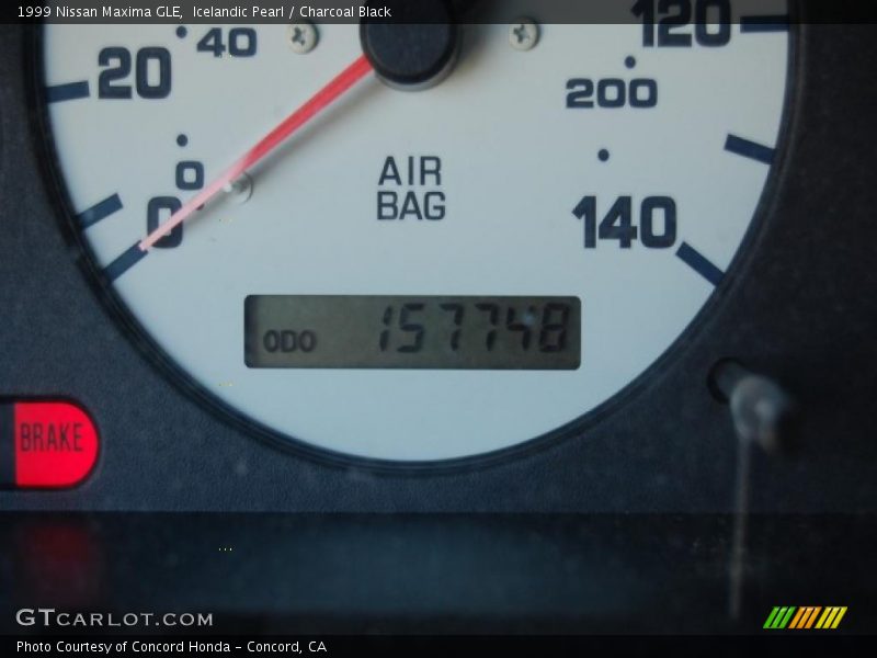 Icelandic Pearl / Charcoal Black 1999 Nissan Maxima GLE