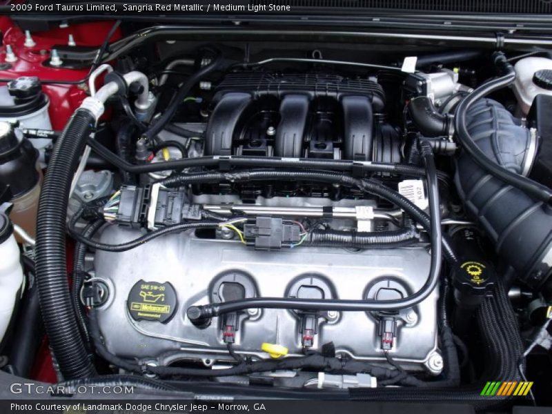 Sangria Red Metallic / Medium Light Stone 2009 Ford Taurus Limited