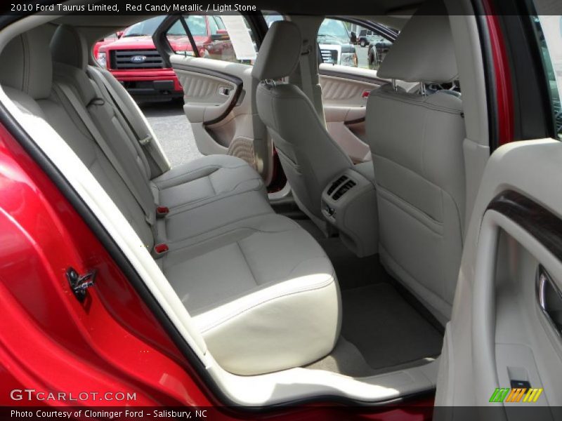 Red Candy Metallic / Light Stone 2010 Ford Taurus Limited