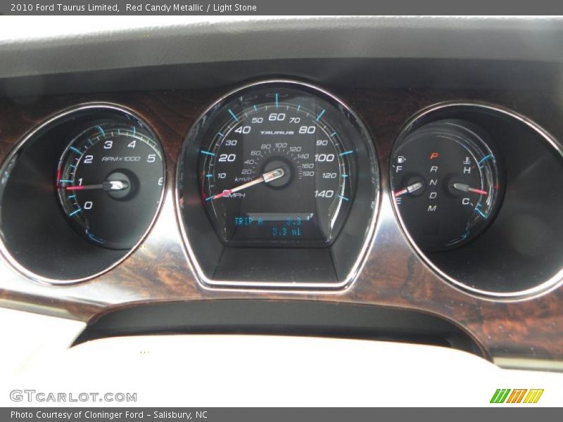 Red Candy Metallic / Light Stone 2010 Ford Taurus Limited