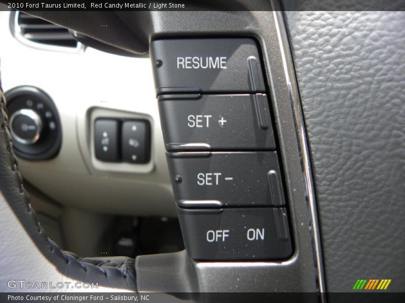 Red Candy Metallic / Light Stone 2010 Ford Taurus Limited