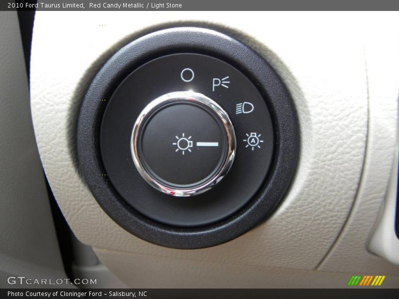 Red Candy Metallic / Light Stone 2010 Ford Taurus Limited