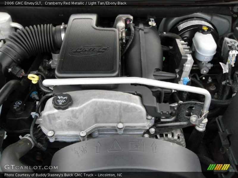 Cranberry Red Metallic / Light Tan/Ebony Black 2006 GMC Envoy SLT