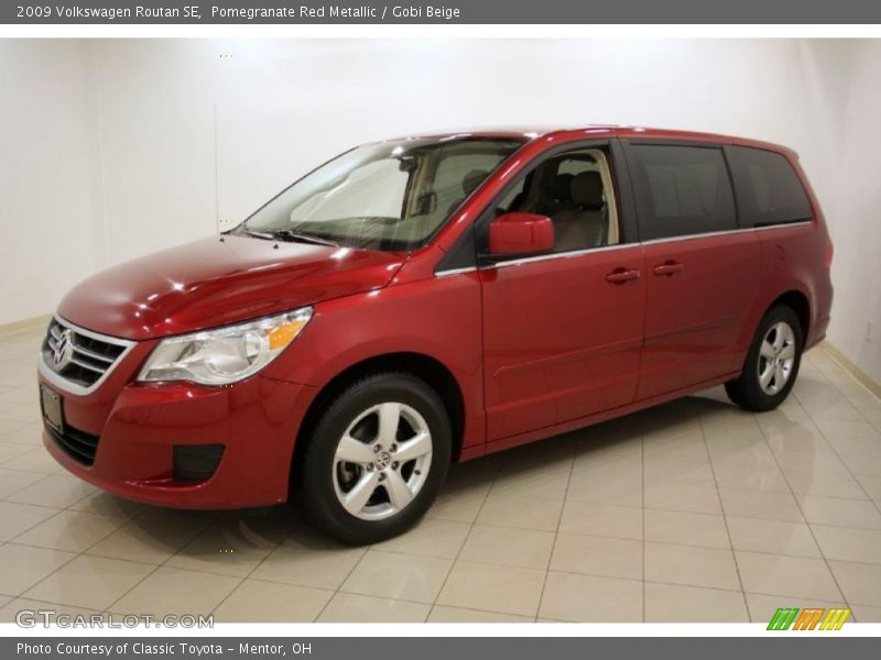 Pomegranate Red Metallic / Gobi Beige 2009 Volkswagen Routan SE