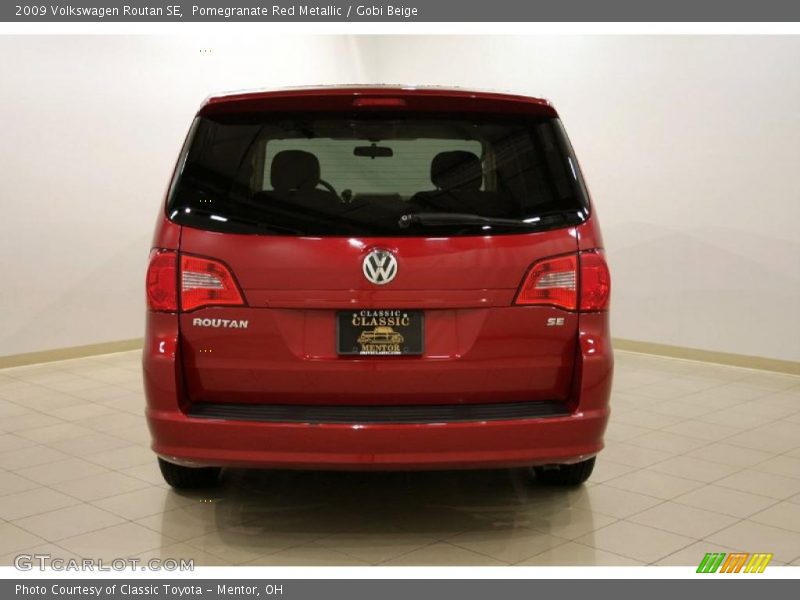 Pomegranate Red Metallic / Gobi Beige 2009 Volkswagen Routan SE