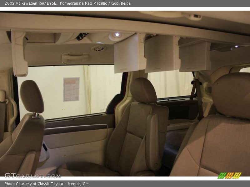 Pomegranate Red Metallic / Gobi Beige 2009 Volkswagen Routan SE