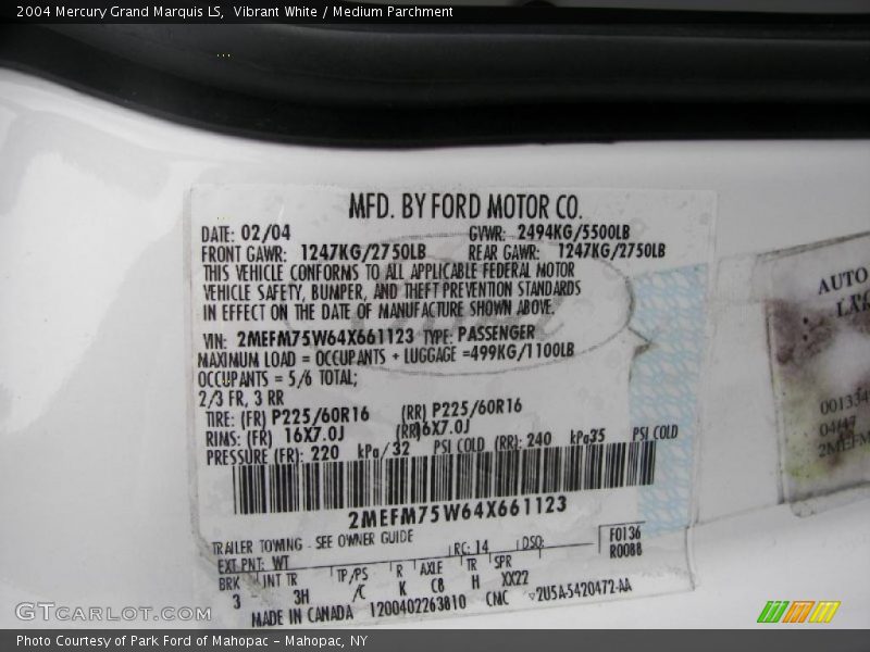 Vibrant White / Medium Parchment 2004 Mercury Grand Marquis LS