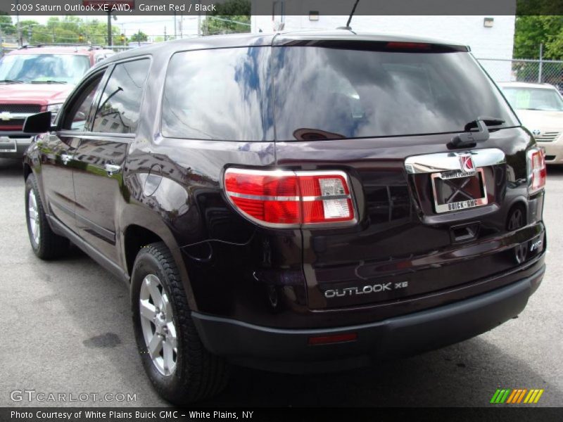 Garnet Red / Black 2009 Saturn Outlook XE AWD
