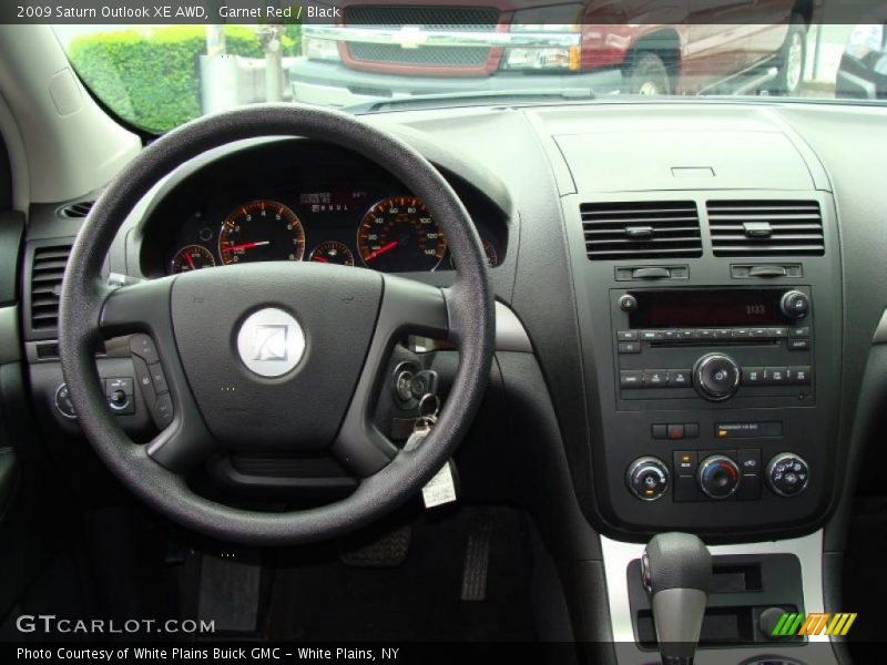 Garnet Red / Black 2009 Saturn Outlook XE AWD