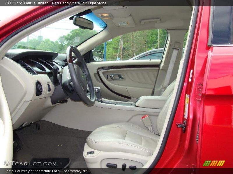 Red Candy Metallic / Light Stone 2010 Ford Taurus Limited