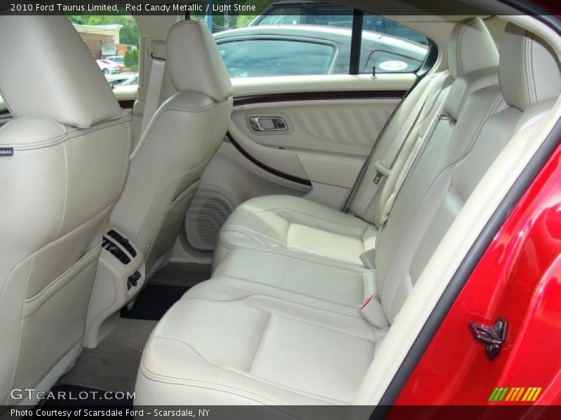 Red Candy Metallic / Light Stone 2010 Ford Taurus Limited