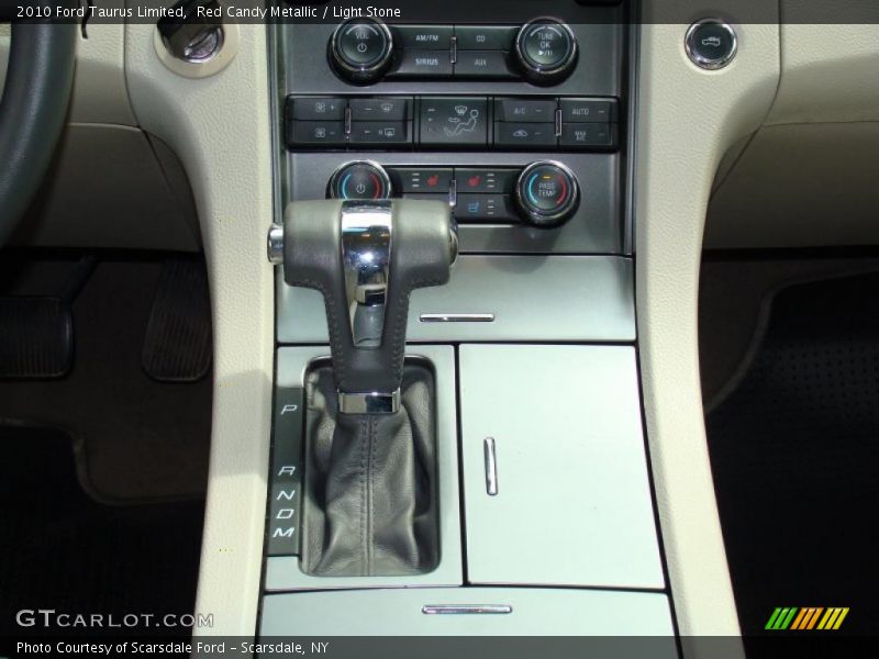 Red Candy Metallic / Light Stone 2010 Ford Taurus Limited