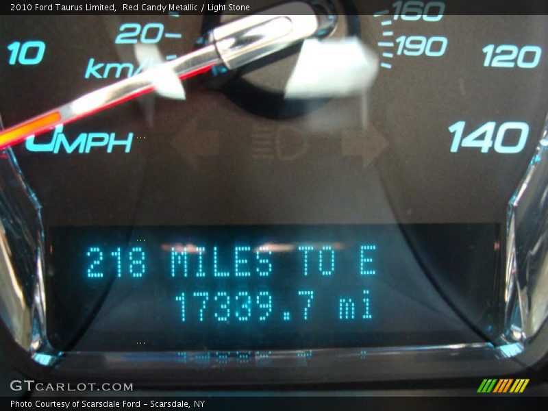 Red Candy Metallic / Light Stone 2010 Ford Taurus Limited