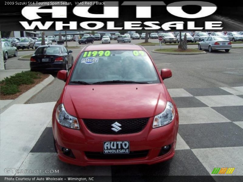 Vivid Red / Black 2009 Suzuki SX4 Touring Sport Sedan