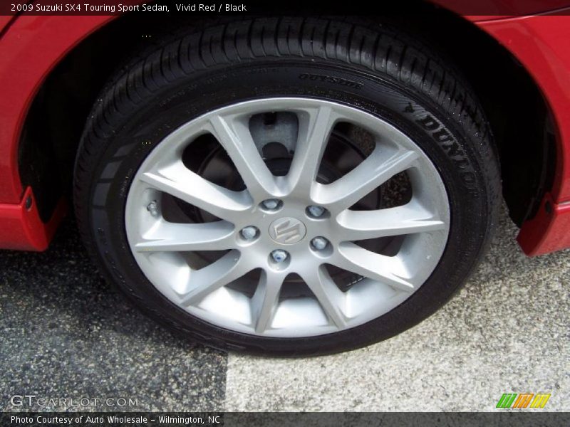 Vivid Red / Black 2009 Suzuki SX4 Touring Sport Sedan