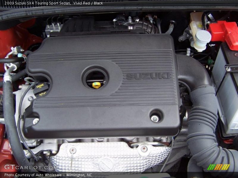 Vivid Red / Black 2009 Suzuki SX4 Touring Sport Sedan