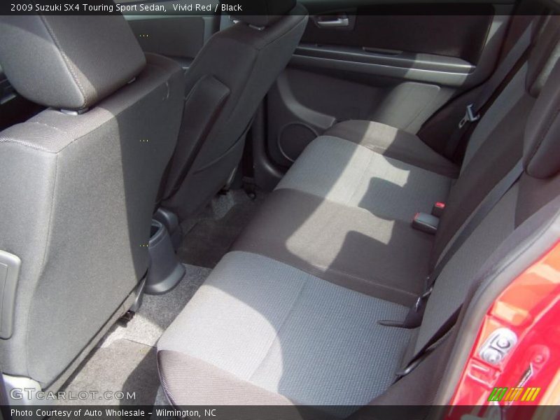 Vivid Red / Black 2009 Suzuki SX4 Touring Sport Sedan
