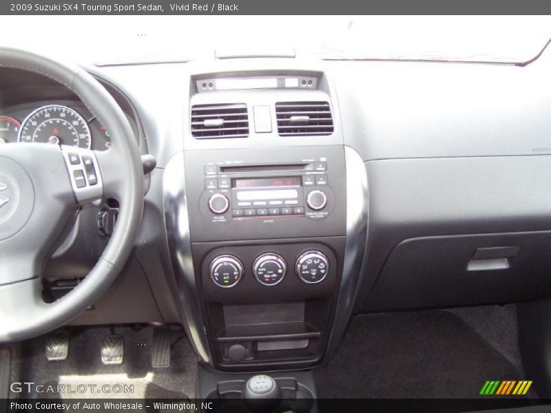 Vivid Red / Black 2009 Suzuki SX4 Touring Sport Sedan