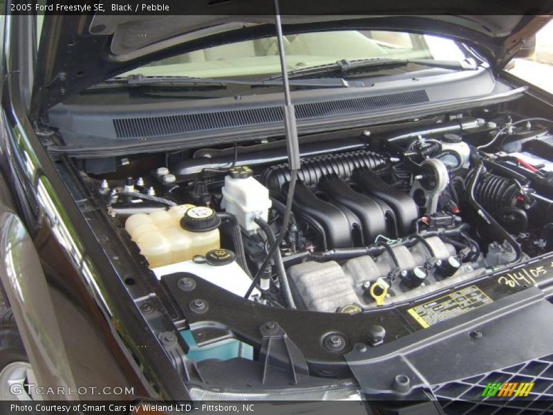 Black / Pebble 2005 Ford Freestyle SE