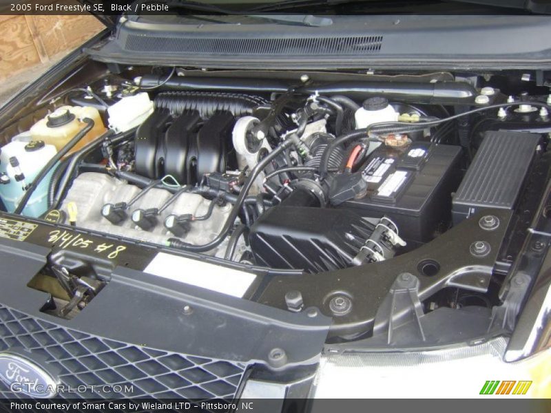 Black / Pebble 2005 Ford Freestyle SE