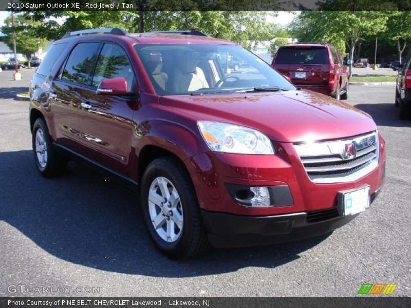 Red Jewel / Tan 2010 Saturn Outlook XE