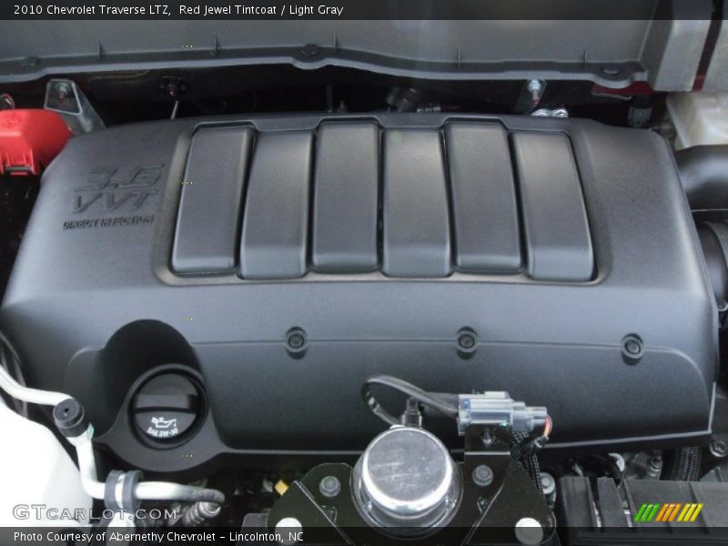 Red Jewel Tintcoat / Light Gray 2010 Chevrolet Traverse LTZ