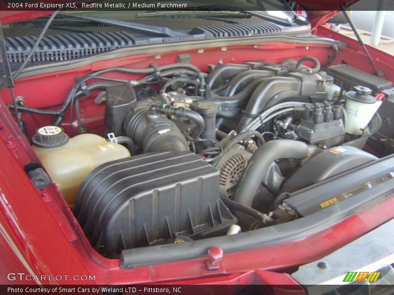 Redfire Metallic / Medium Parchment 2004 Ford Explorer XLS