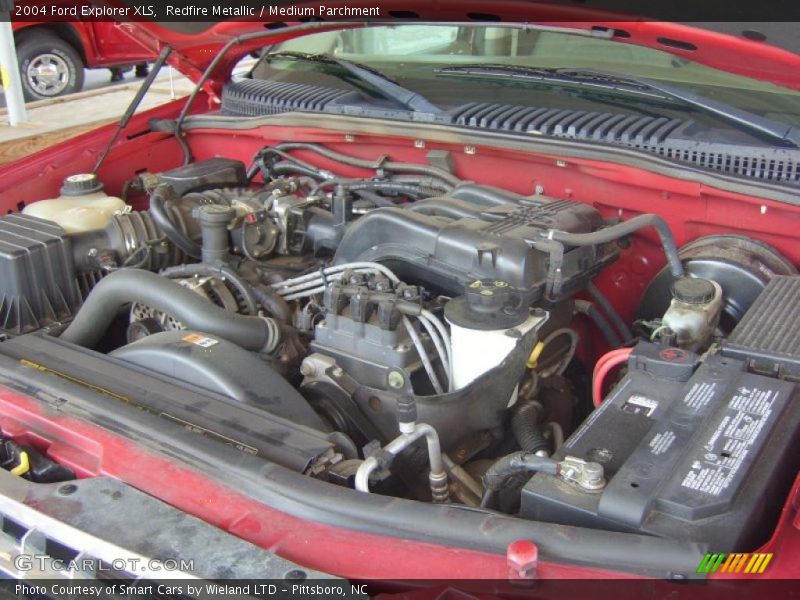 Redfire Metallic / Medium Parchment 2004 Ford Explorer XLS