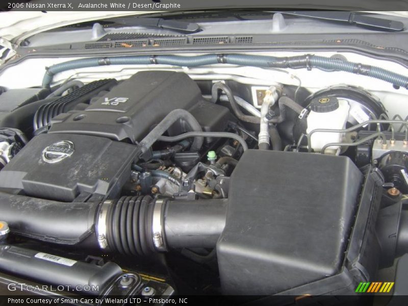 Avalanche White / Desert/Graphite 2006 Nissan Xterra X