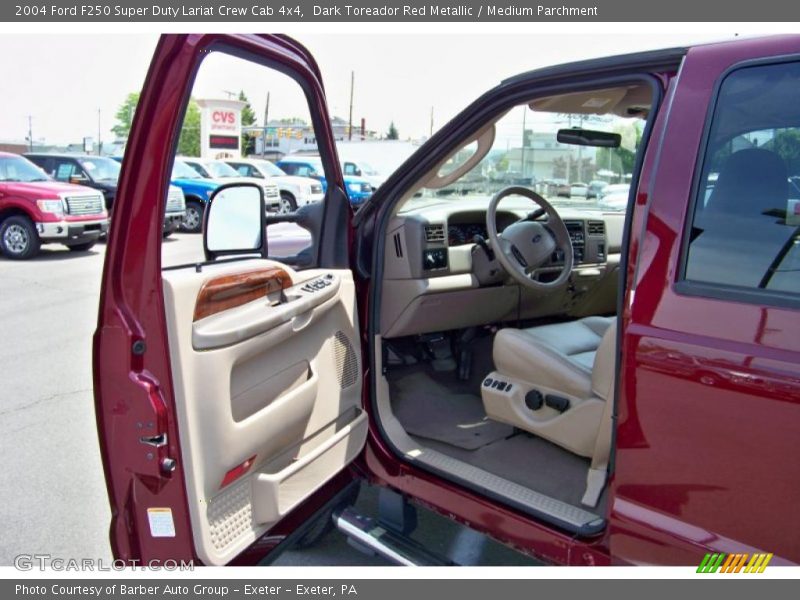 Dark Toreador Red Metallic / Medium Parchment 2004 Ford F250 Super Duty Lariat Crew Cab 4x4