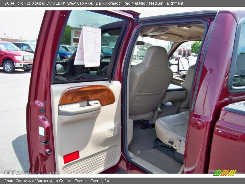 Dark Toreador Red Metallic / Medium Parchment 2004 Ford F250 Super Duty Lariat Crew Cab 4x4