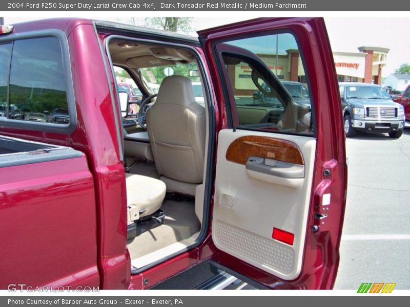 Dark Toreador Red Metallic / Medium Parchment 2004 Ford F250 Super Duty Lariat Crew Cab 4x4