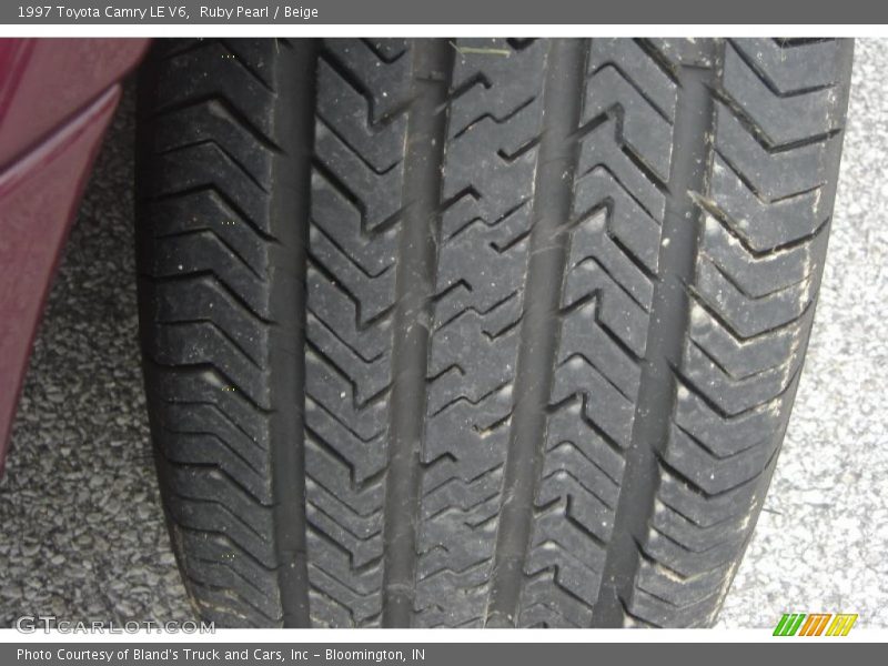 Ruby Pearl / Beige 1997 Toyota Camry LE V6