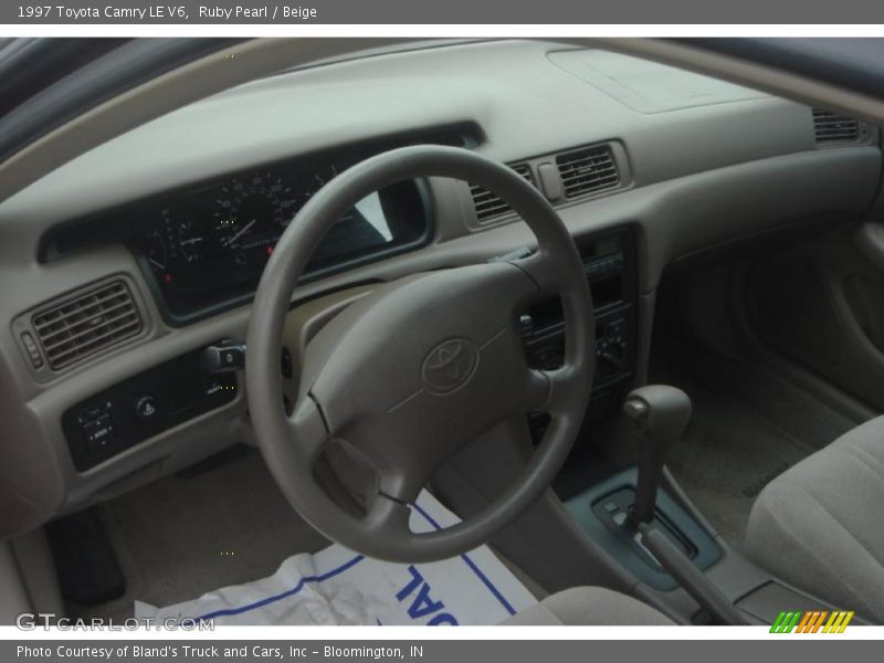 Ruby Pearl / Beige 1997 Toyota Camry LE V6