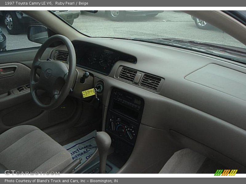 Ruby Pearl / Beige 1997 Toyota Camry LE V6