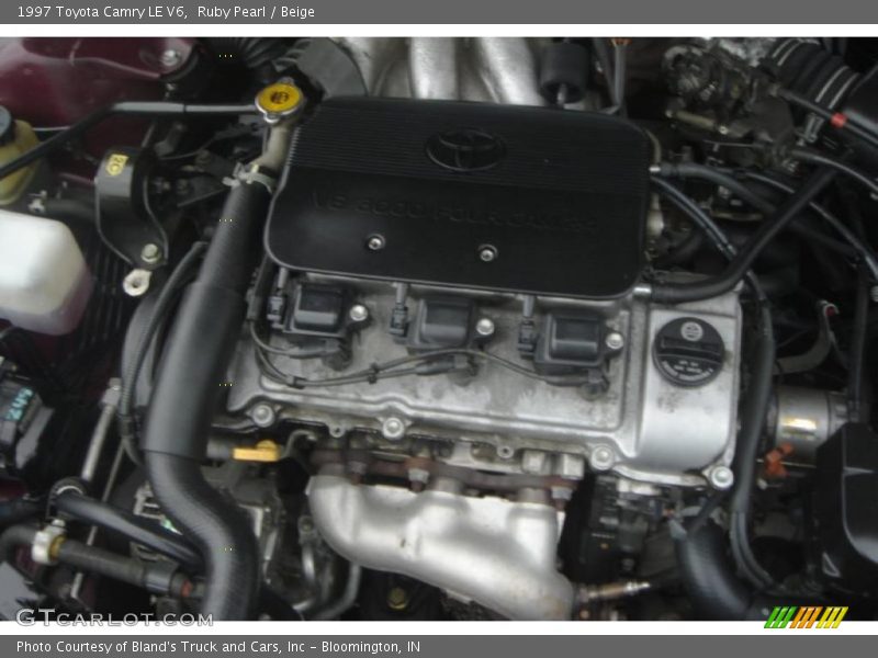 Ruby Pearl / Beige 1997 Toyota Camry LE V6