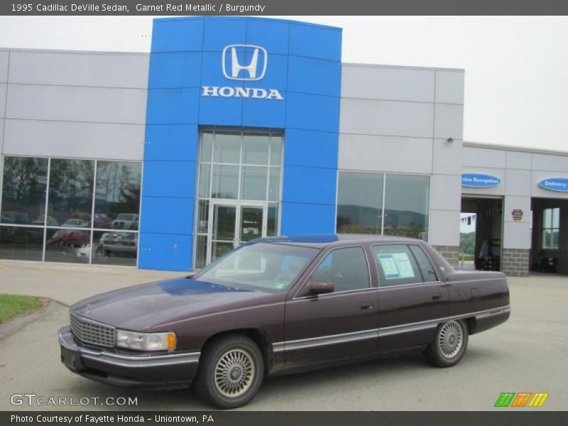 Garnet Red Metallic / Burgundy 1995 Cadillac DeVille Sedan