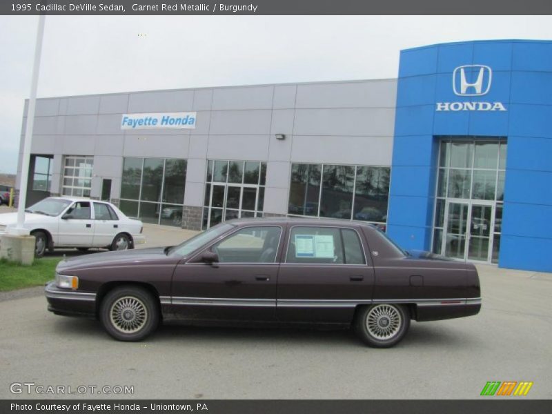 Garnet Red Metallic / Burgundy 1995 Cadillac DeVille Sedan