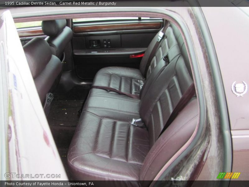 Garnet Red Metallic / Burgundy 1995 Cadillac DeVille Sedan