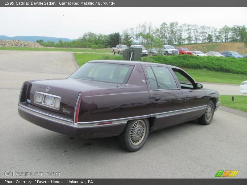 Garnet Red Metallic / Burgundy 1995 Cadillac DeVille Sedan