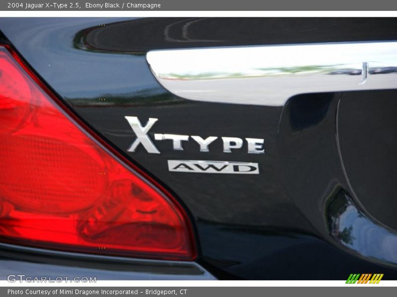 Ebony Black / Champagne 2004 Jaguar X-Type 2.5