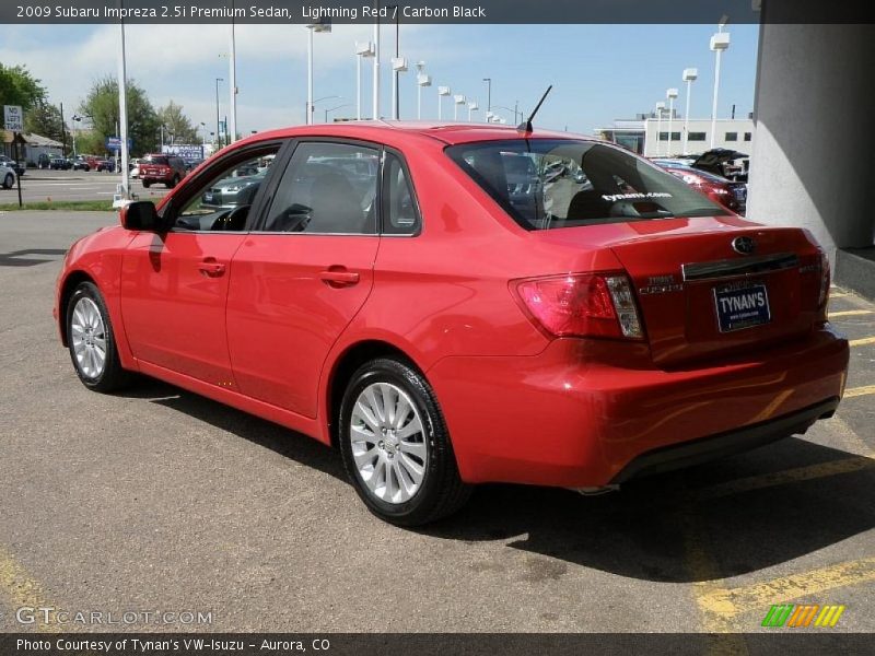 Lightning Red / Carbon Black 2009 Subaru Impreza 2.5i Premium Sedan