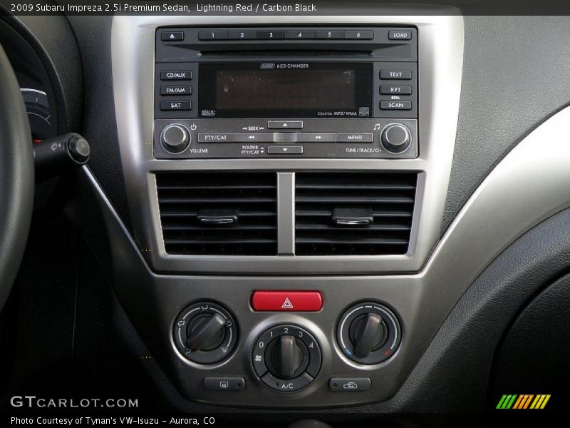 Lightning Red / Carbon Black 2009 Subaru Impreza 2.5i Premium Sedan